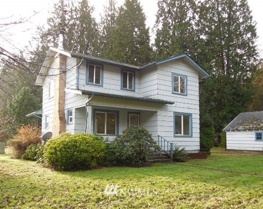 141 Roe Road Winlock, WA 98596 - Photo 1 of 1 a view of a house with a yard