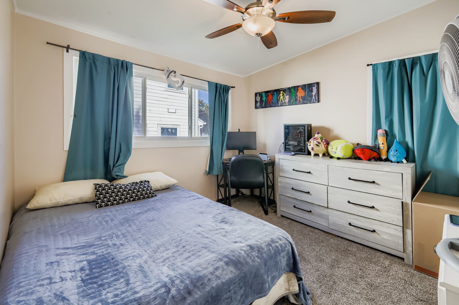 19W720 Woodland Avenue Addison, IL 60101 - Photo 12 of 17 a bedroom with a bed and a window