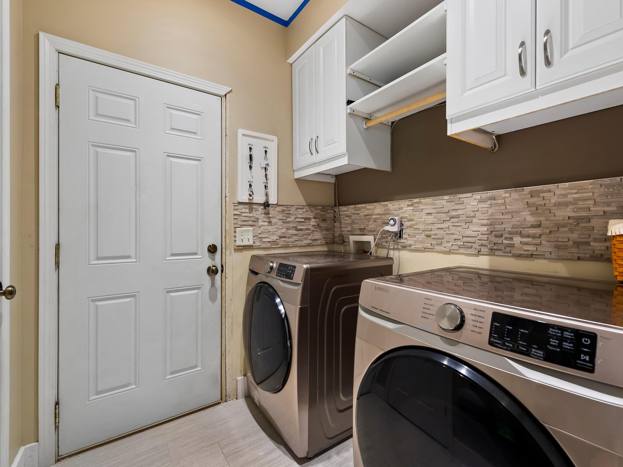 480 Meadowview Drive Saluda, NC 28773 - Photo 14 of 44 a utility room with dryer and washer