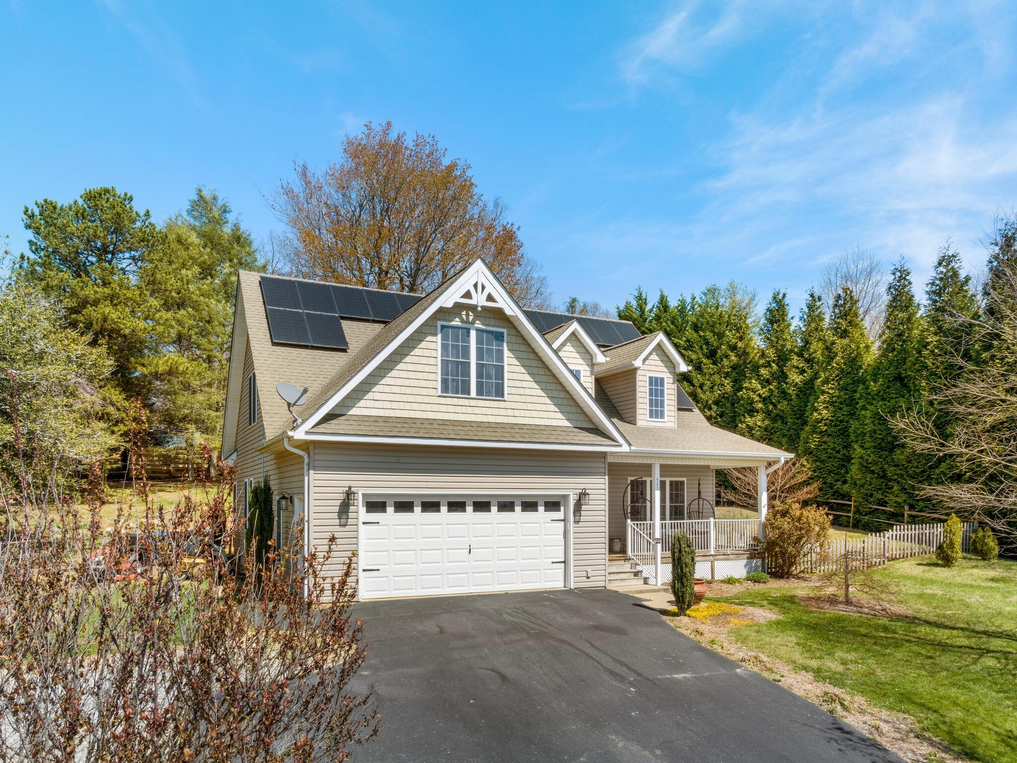 480 Meadowview Drive Saluda, NC 28773 - Photo 34 of 44 a front view of a house with a yard