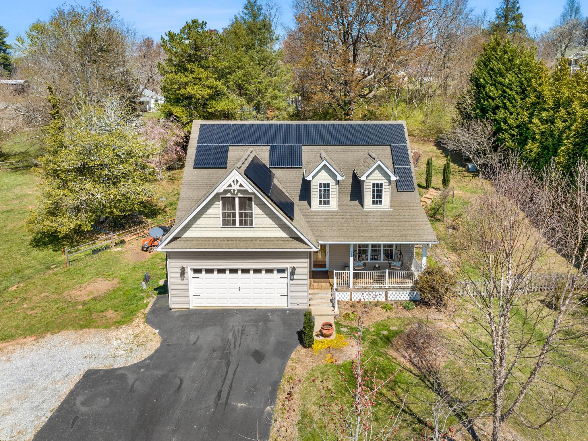 480 Meadowview Drive Saluda, NC 28773 - Photo 35 of 44 a front view of a house with a yard