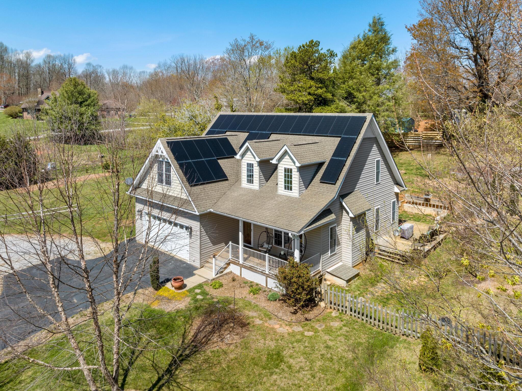 480 Meadowview Drive Saluda, NC 28773 - Photo 36 of 44 a view of a house with pool and sitting area