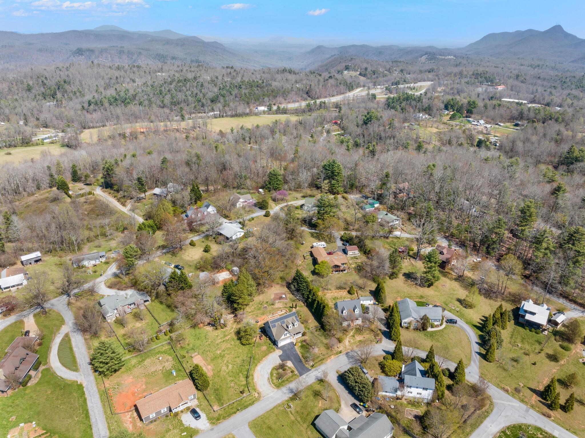 480 Meadowview Drive Saluda, NC 28773 - Photo 40 of 44 an aerial view of residential house with parking and trees