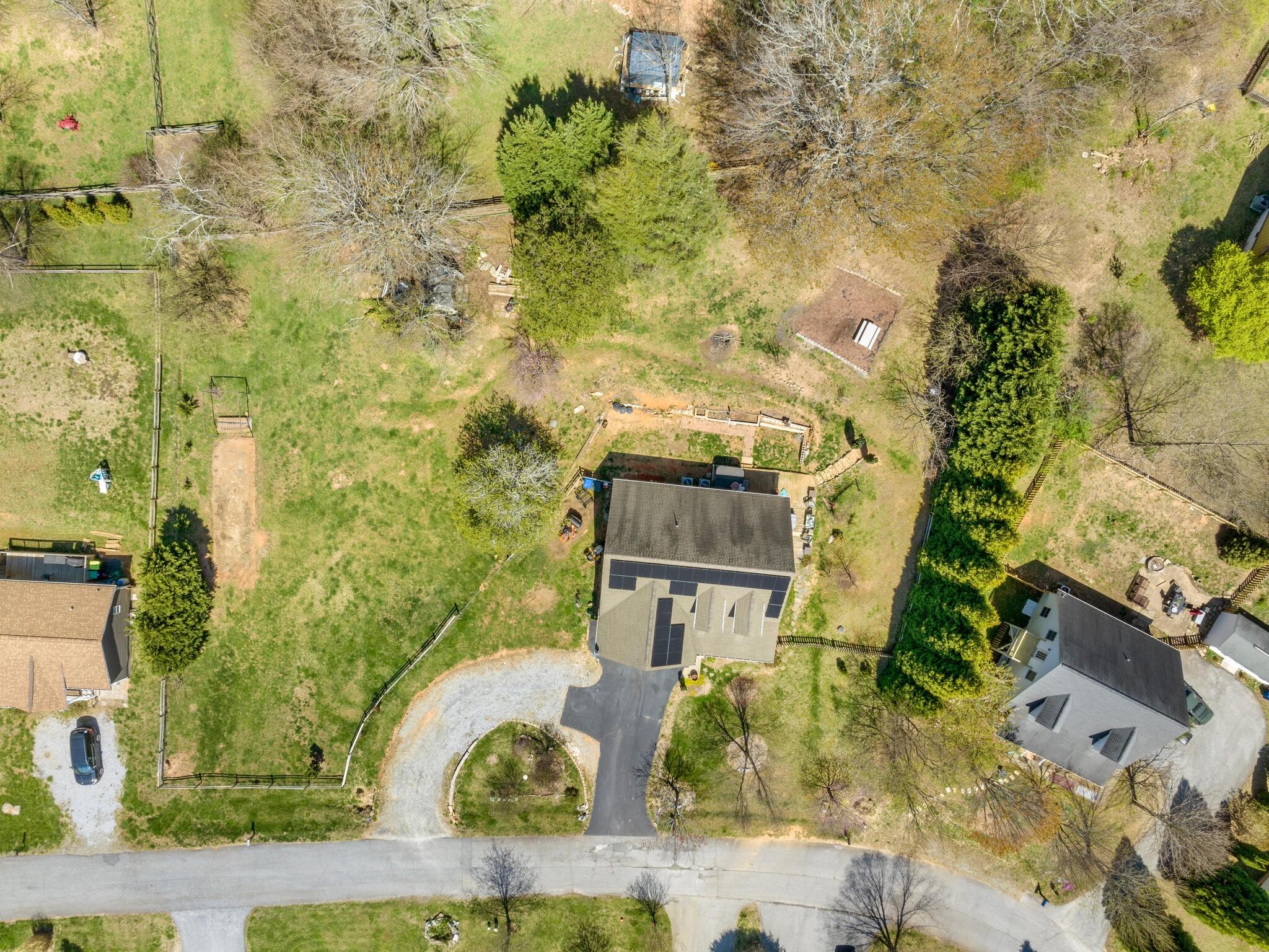 480 Meadowview Drive Saluda, NC 28773 - Photo 42 of 44 an aerial view of residential houses with outdoor space