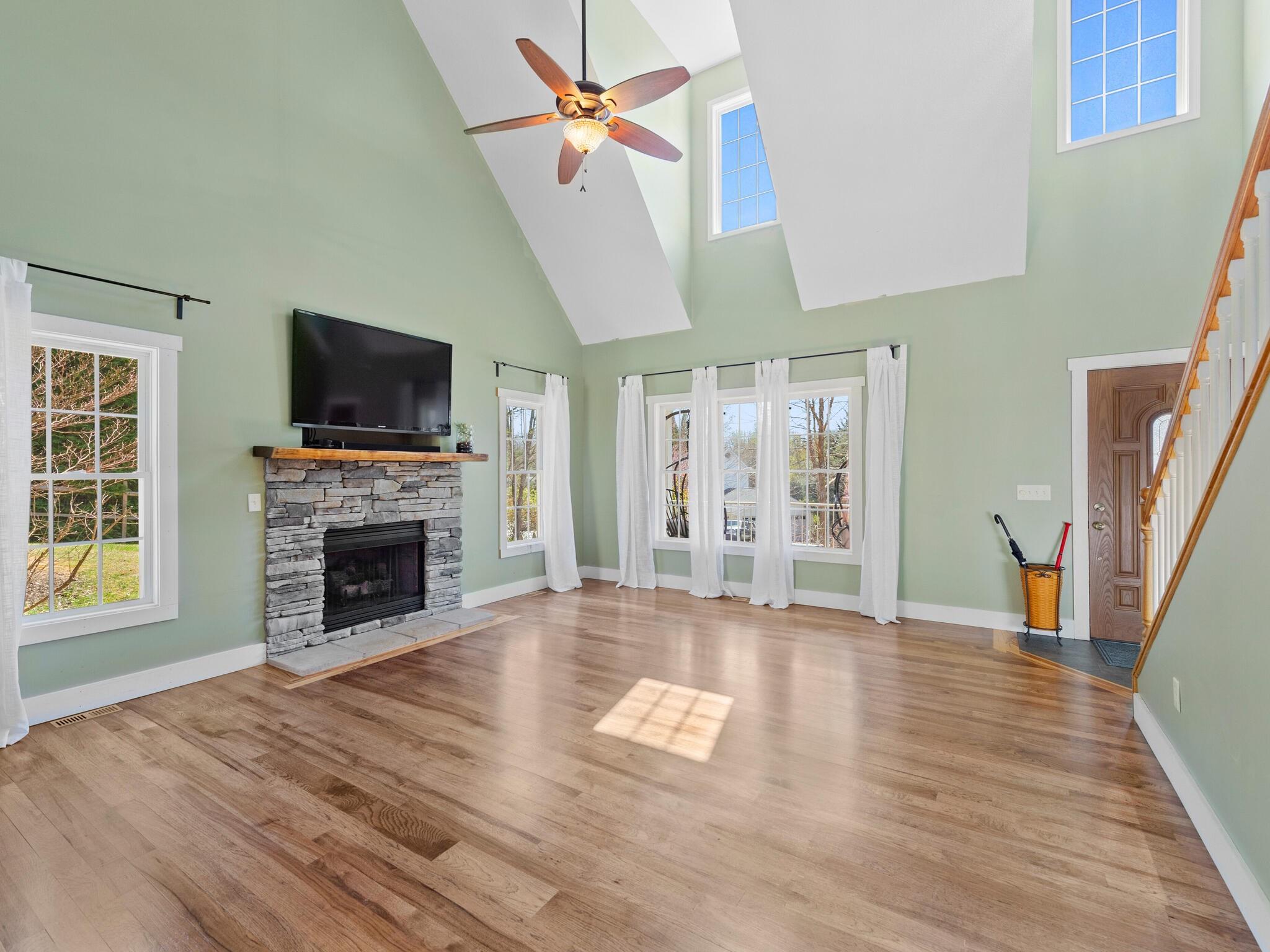 480 Meadowview Drive Saluda, NC 28773 - Photo 5 of 44 a view of an empty room with wooden floor and a window