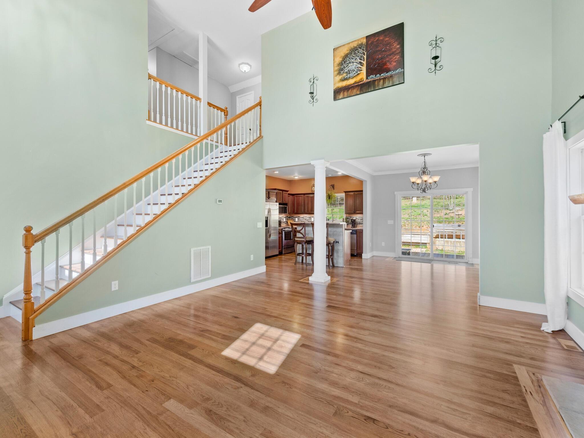 480 Meadowview Drive Saluda, NC 28773 - Photo 8 of 44 a view of entryway and hall with wooden floor