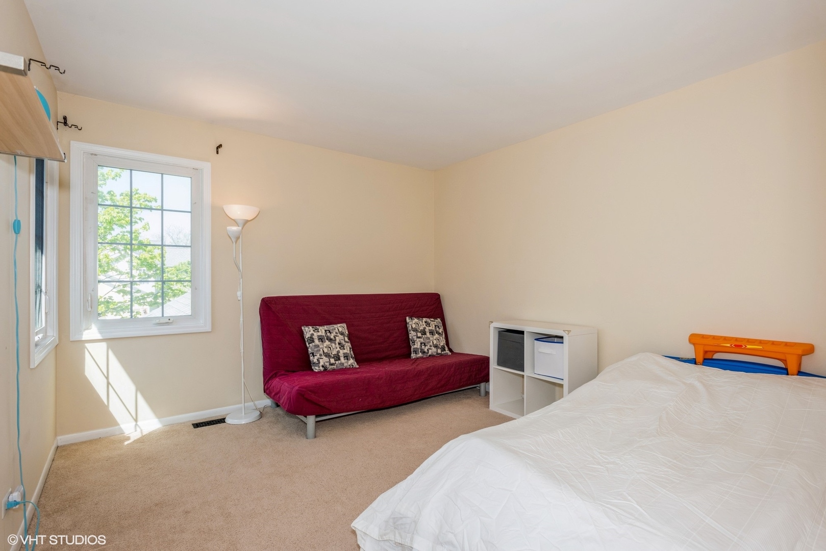 1475 Golfview Drive Glendale Heights, IL 60139 - Photo 12 of 17 a living room with furniture and a window