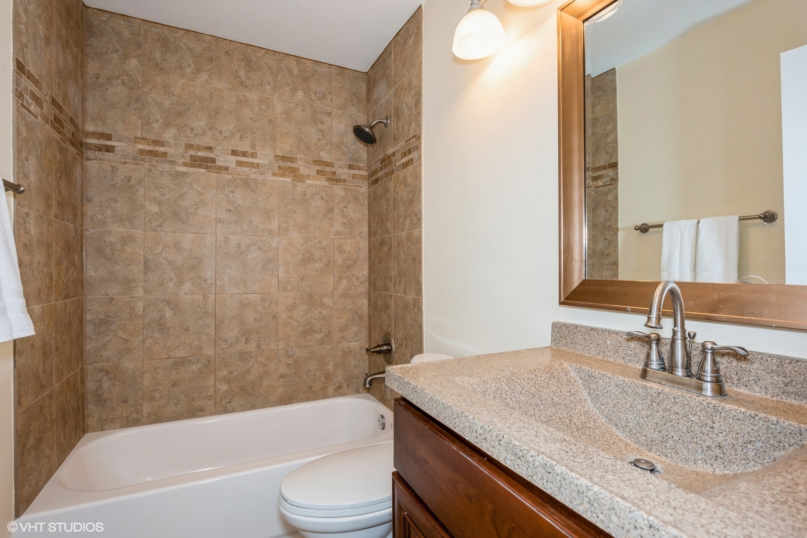 1475 Golfview Drive Glendale Heights, IL 60139 - Photo 13 of 17 a bathroom with a granite countertop bathtub shower sink vanity and toilet