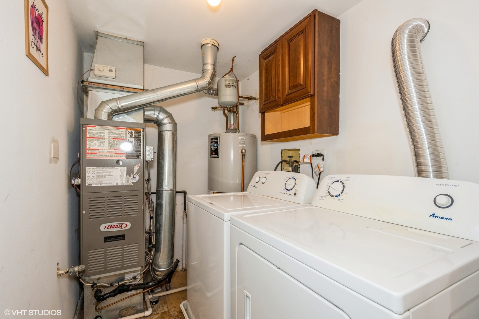 1475 Golfview Drive Glendale Heights, IL 60139 - Photo 14 of 17 a utility room with dryer and washer