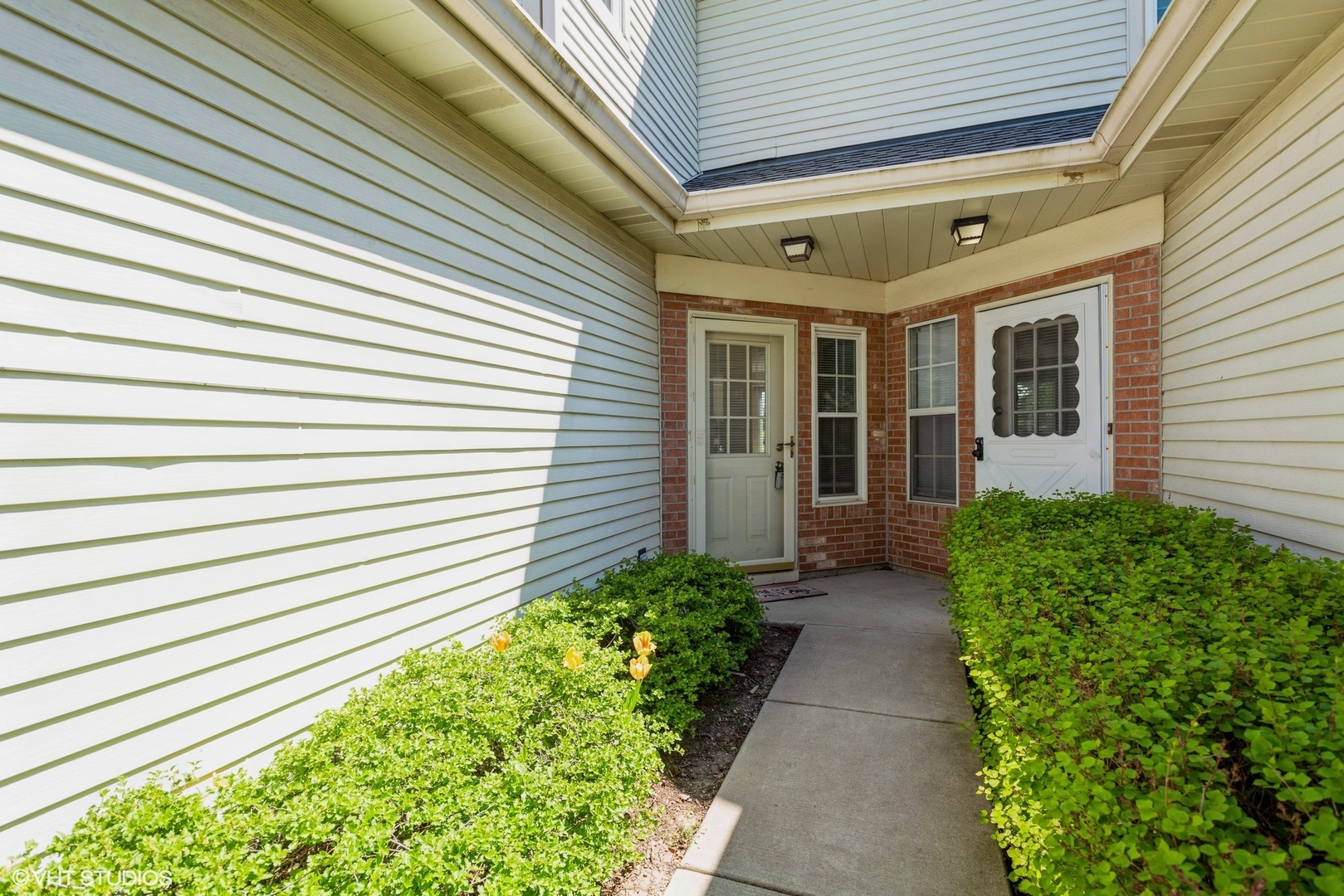 1475 Golfview Drive Glendale Heights, IL 60139 - Photo 2 of 17 a view of a pathway with a house