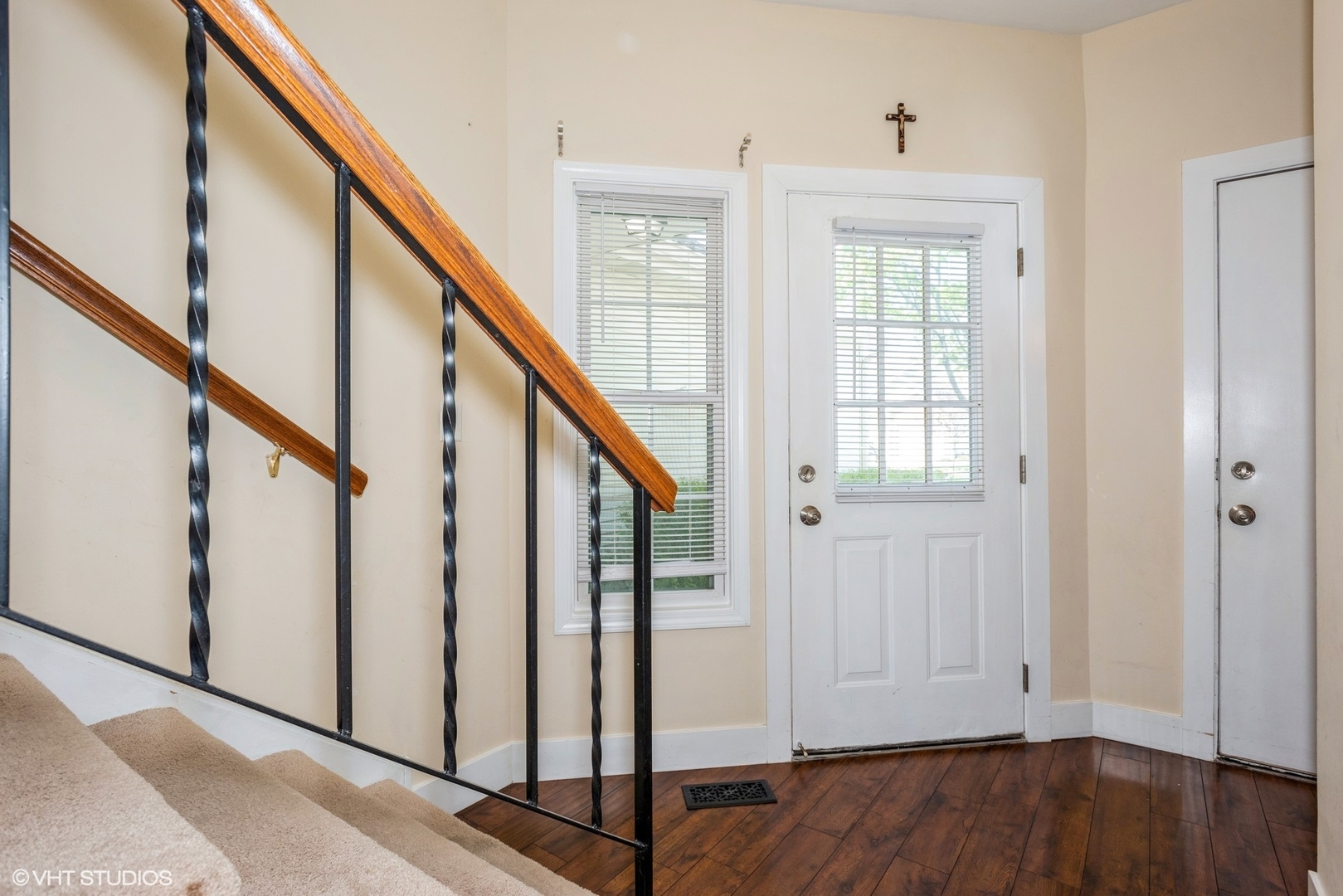 1475 Golfview Drive Glendale Heights, IL 60139 - Photo 3 of 17 a view of an entryway with wooden floor and staircase