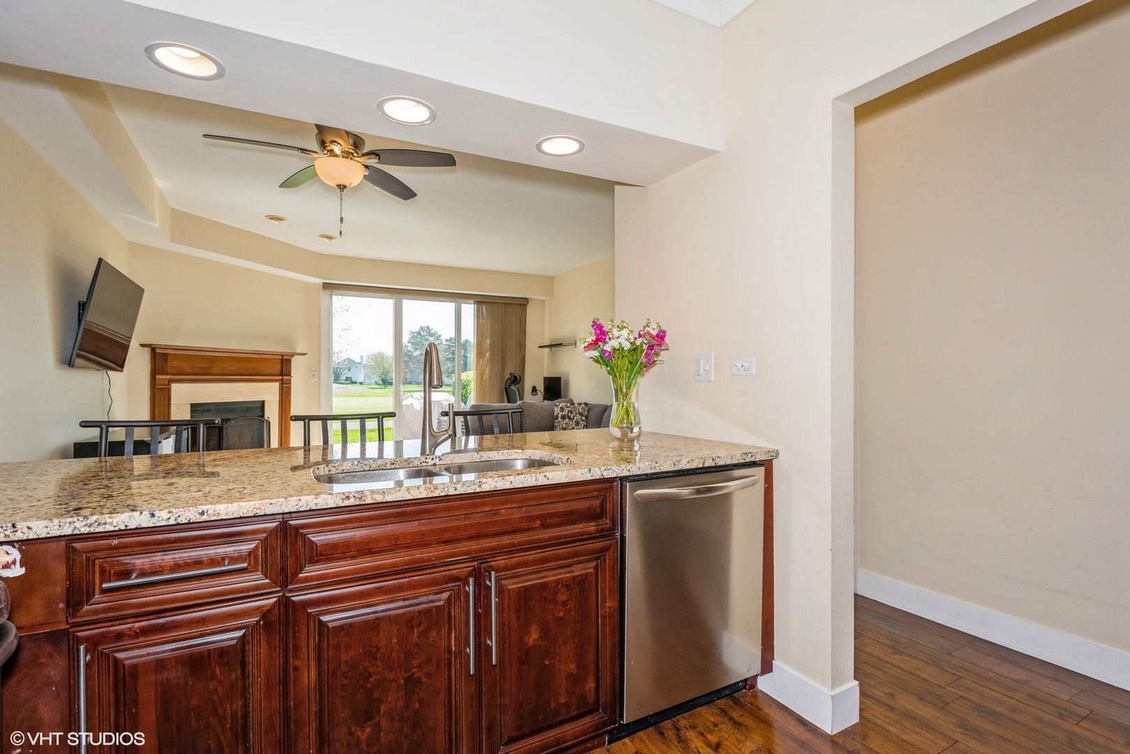 1475 Golfview Drive Glendale Heights, IL 60139 - Photo 5 of 17 a bathroom with a granite countertop sink a mirror and a window