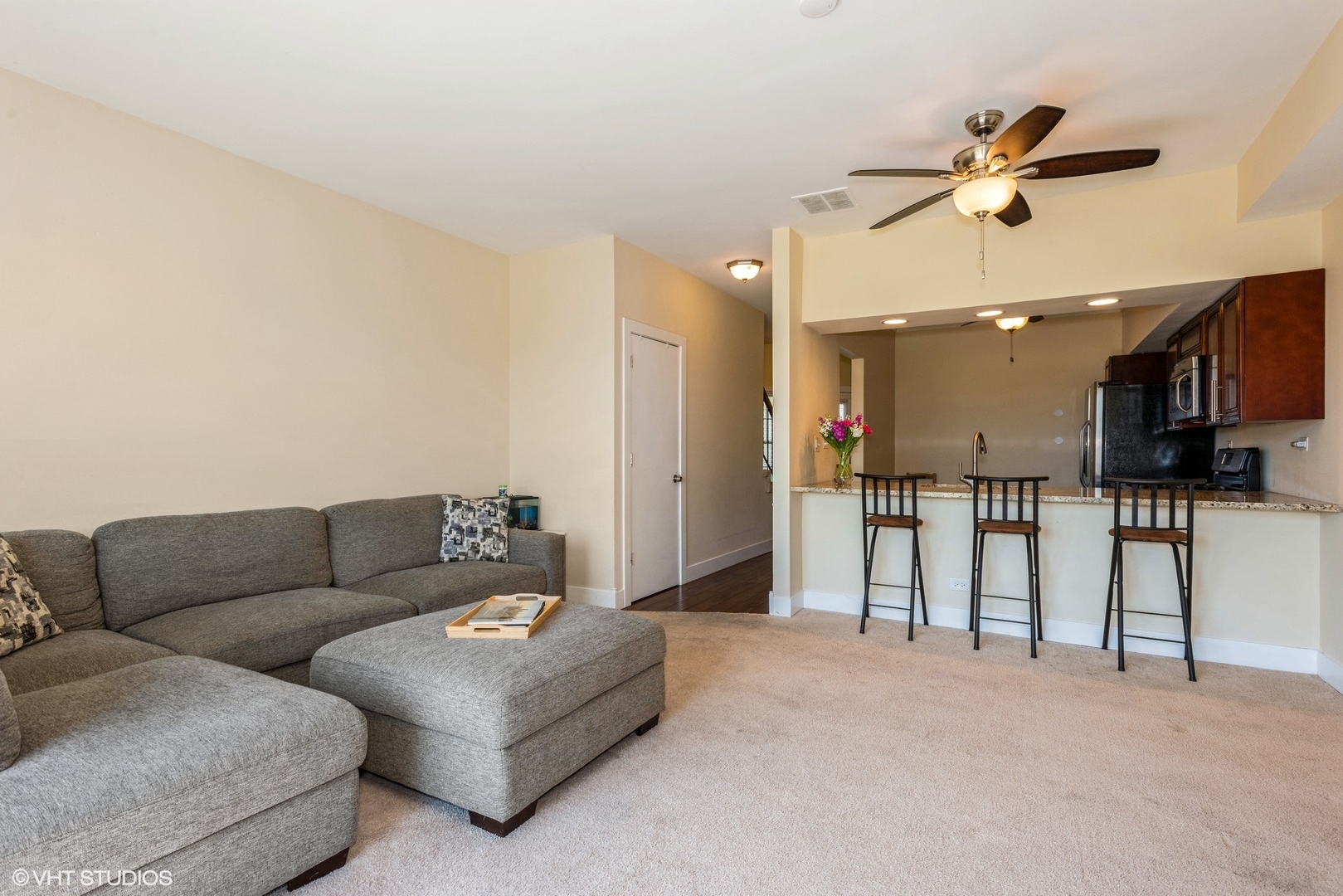 1475 Golfview Drive Glendale Heights, IL 60139 - Photo 6 of 17 a living room with furniture and kitchen view