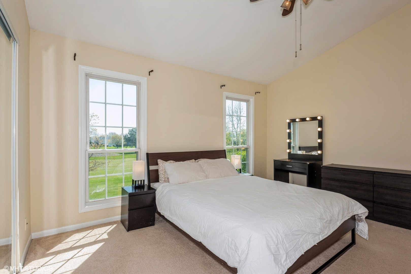 1475 Golfview Drive Glendale Heights, IL 60139 - Photo 10 of 17 a bedroom with a bed and a window