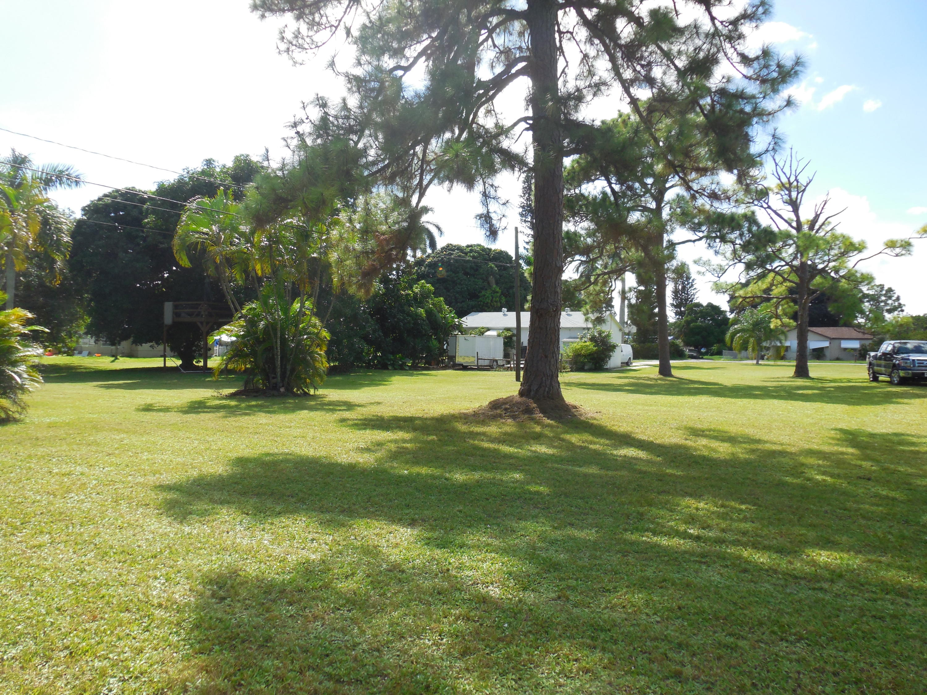 3838 Gulfstream Road Palm Springs, FL 33461 - Photo 22 of 29 3864 Backyard & Vacant Area