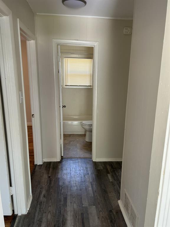 6318 Belgrade Avenue Dallas, TX 75227 - Photo 13 of 23 a view of a bathroom from a hallway