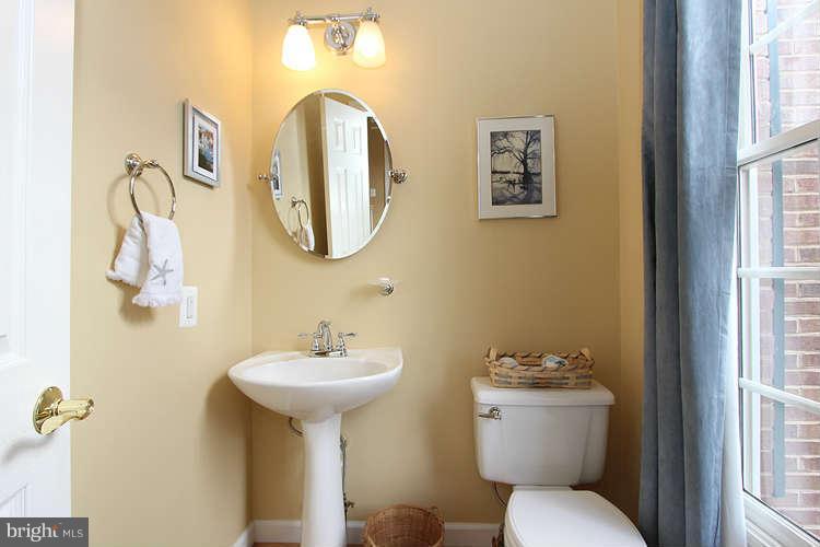 4619 Brightwood Road Olney, MD 20832 - Photo 16 of 30 Half bath with pedestal sink