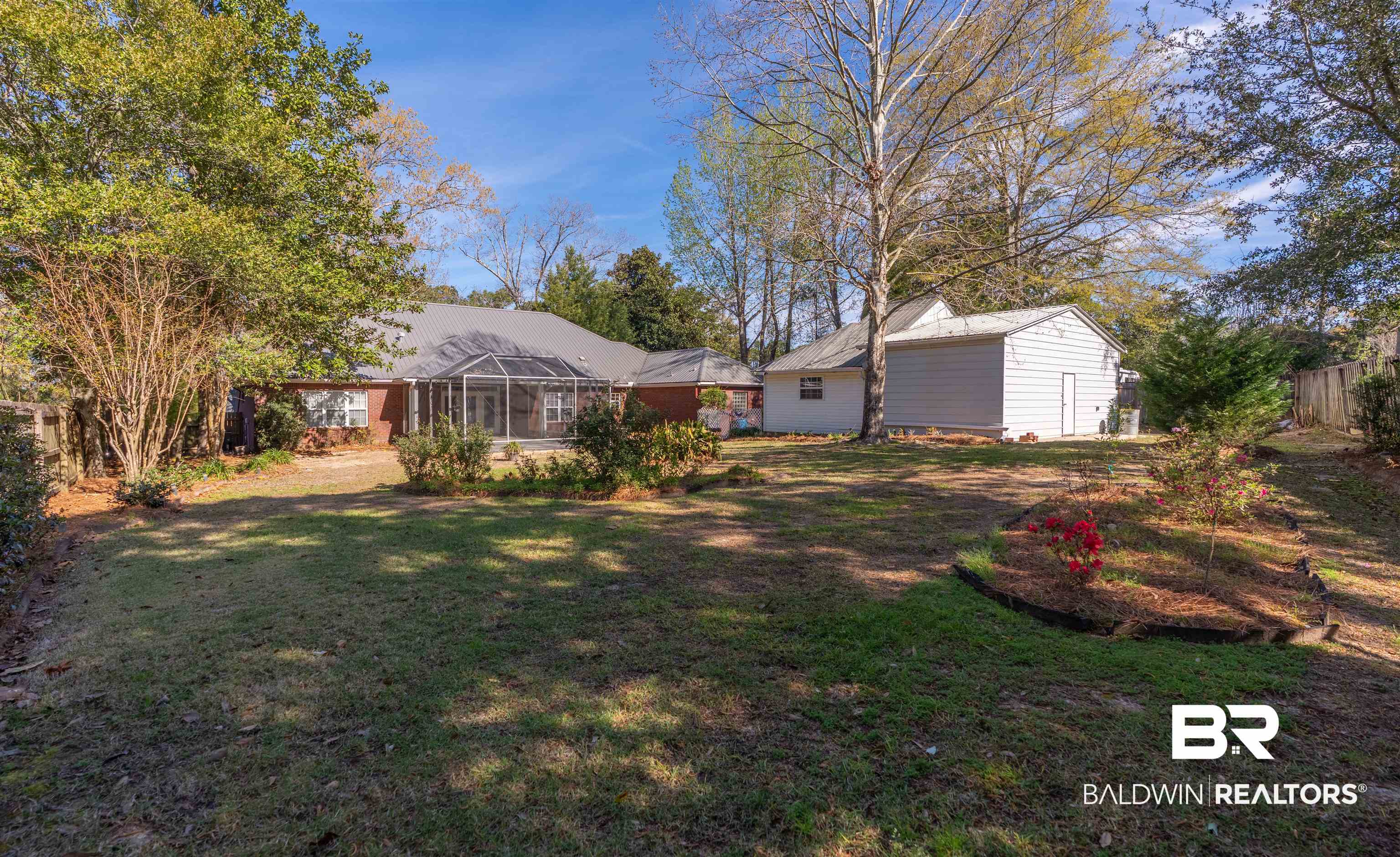 4 Judd Trail Daphne, AL 36527 - Photo 39 of 45 View of yard with a lanai and fence