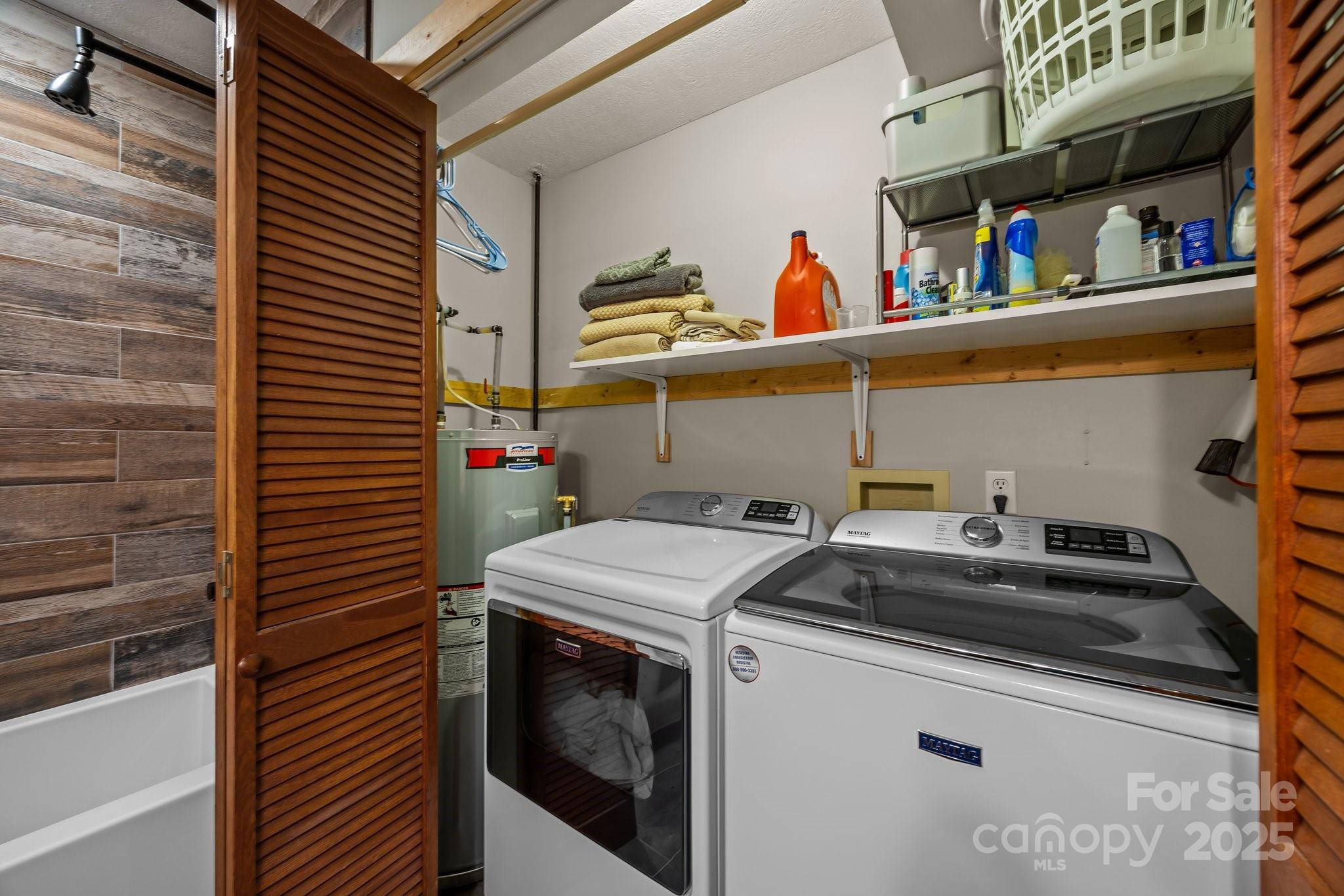 1954 Utah Mountain Road Waynesville, NC 28785 - Photo 24 of 39 a utility room with dryer and washer