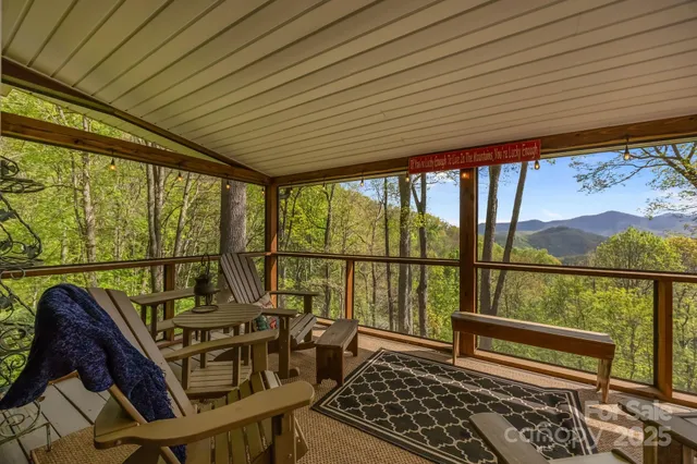 a living room with large windows