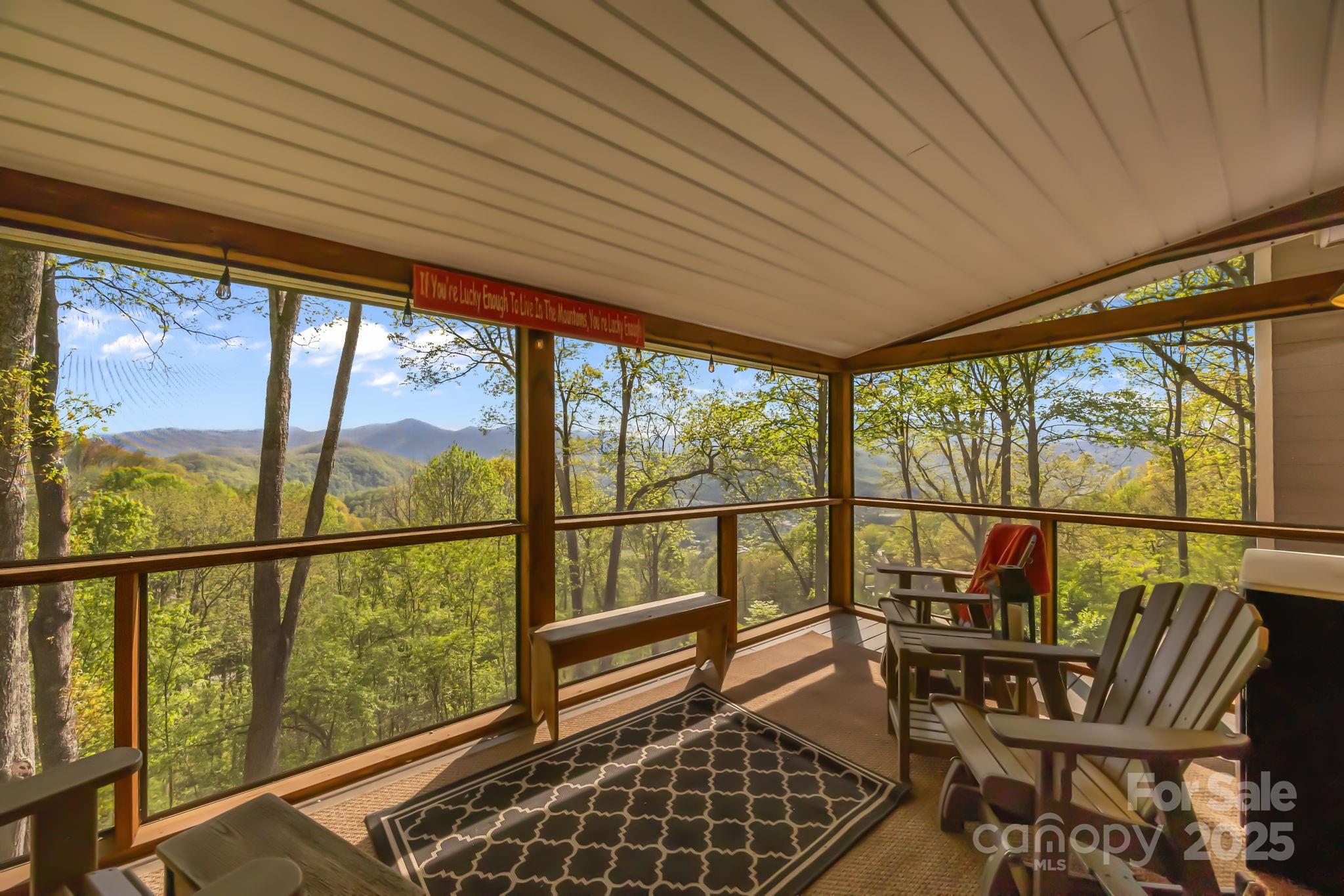 1954 Utah Mountain Road Waynesville, NC 28785 - Photo 36 of 39 workspace with wooden floor and outdoor seating