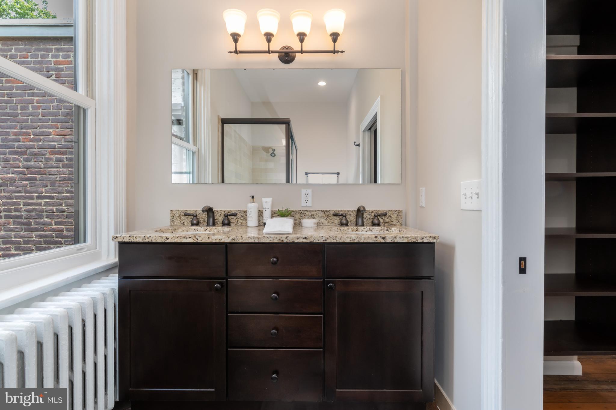 1451 Q Street Northwest Washington, DC 20009 - Photo 37 of 43 Primary bath with large vanity