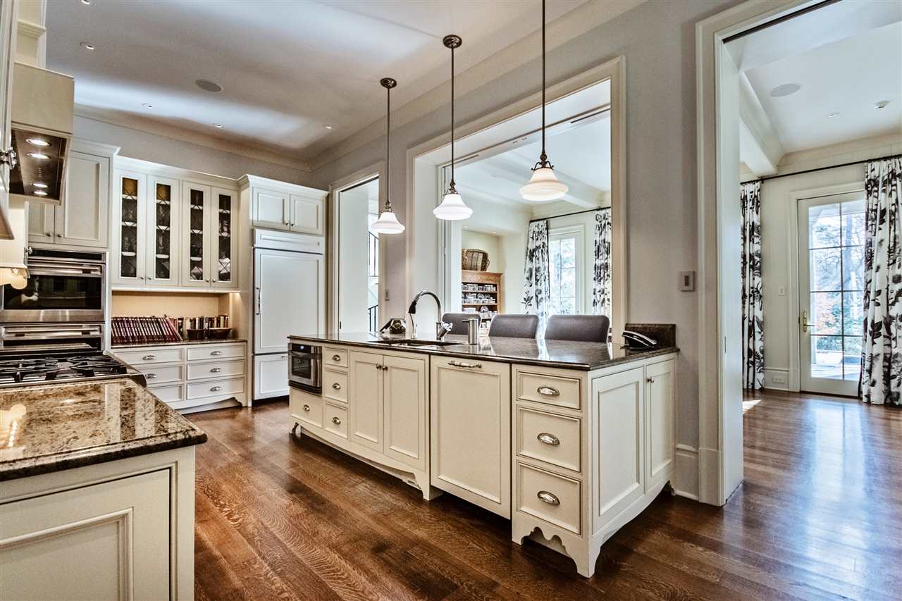 4275 Gwynne Road Memphis, TN 38117 - Photo 11 of 25 Designed with breakfast bar and also can be closed off with serving doors for catering events. A cooking area designed for children to help with preparation as well.