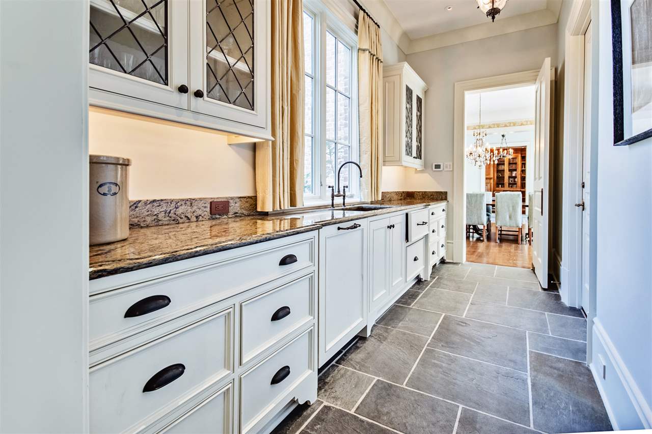 4275 Gwynne Road Memphis, TN 38117 - Photo 13 of 25 Hosting events will be eased with use of this pantry space. Warming drawer, fire proof storage closet, catering sink with garbage disposal, dishwasher and loads of storage for drink ware and serving pieces.