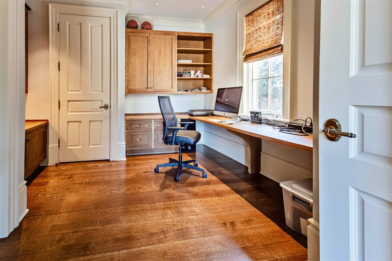 4275 Gwynne Road Memphis, TN 38117 - Photo 15 of 25 This home is designed with TWO home offices located in an isolated area of the home. They could also be converted to in-law quarters or guest suites. Fire proof document storage, built-in desks and shelving.