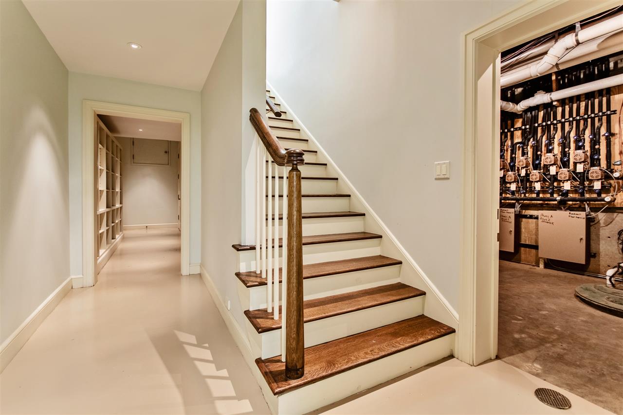 4275 Gwynne Road Memphis, TN 38117 - Photo 17 of 25 The elevator or stairs can take you to the finished basement. There is a storm shelter and bathroom in basement. Storage as well. The home is equipped with Radiant Heat and 13 respective zones.