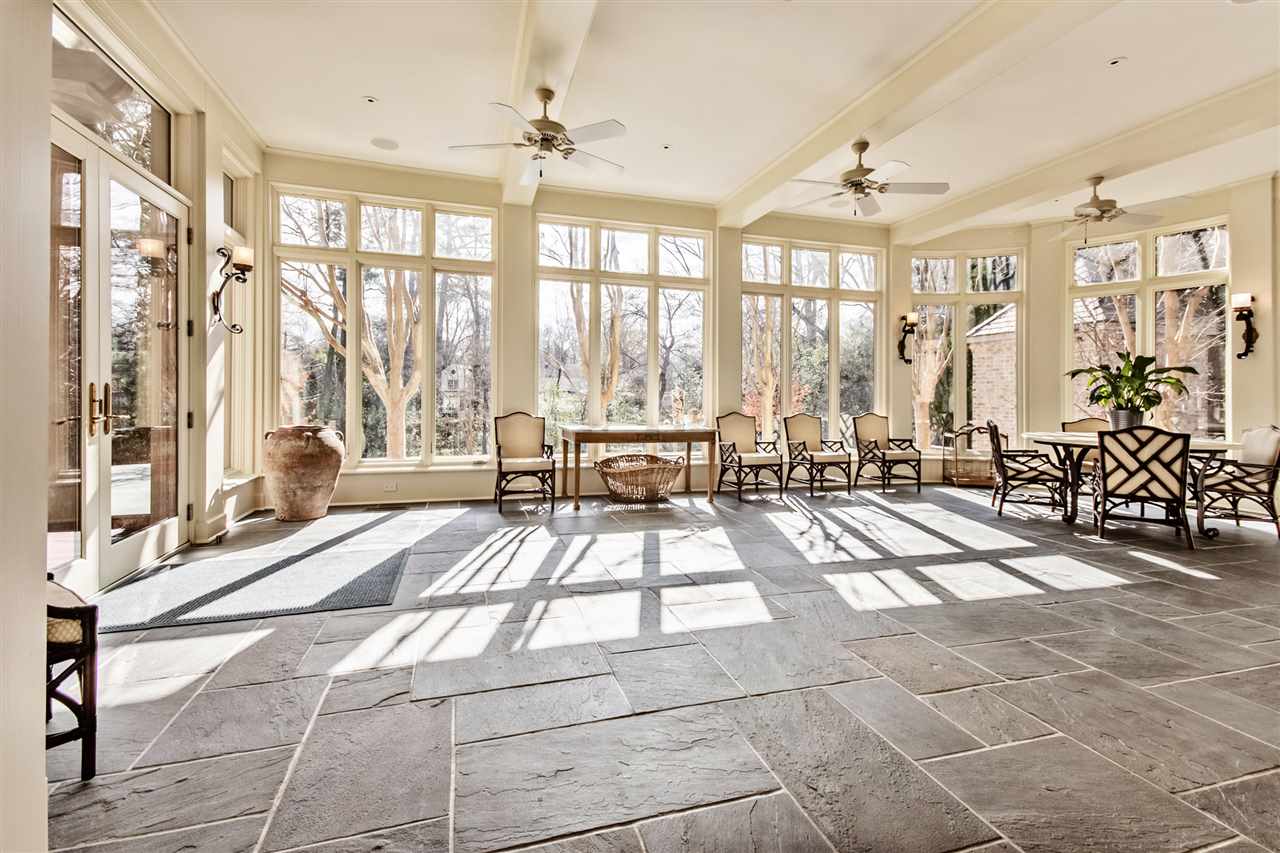 4275 Gwynne Road Memphis, TN 38117 - Photo 9 of 25 This is sunroom is just incredible. It can be transformed into a dining room to host a seated dinner for up to 80. There is a sliding door that separates the den and this sunroom.