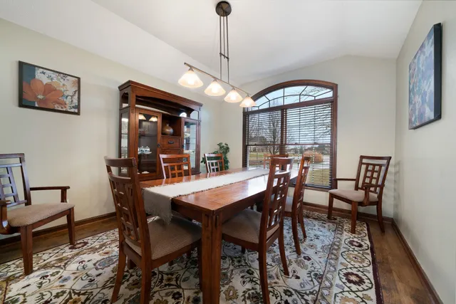 a view of a dining room with furniture