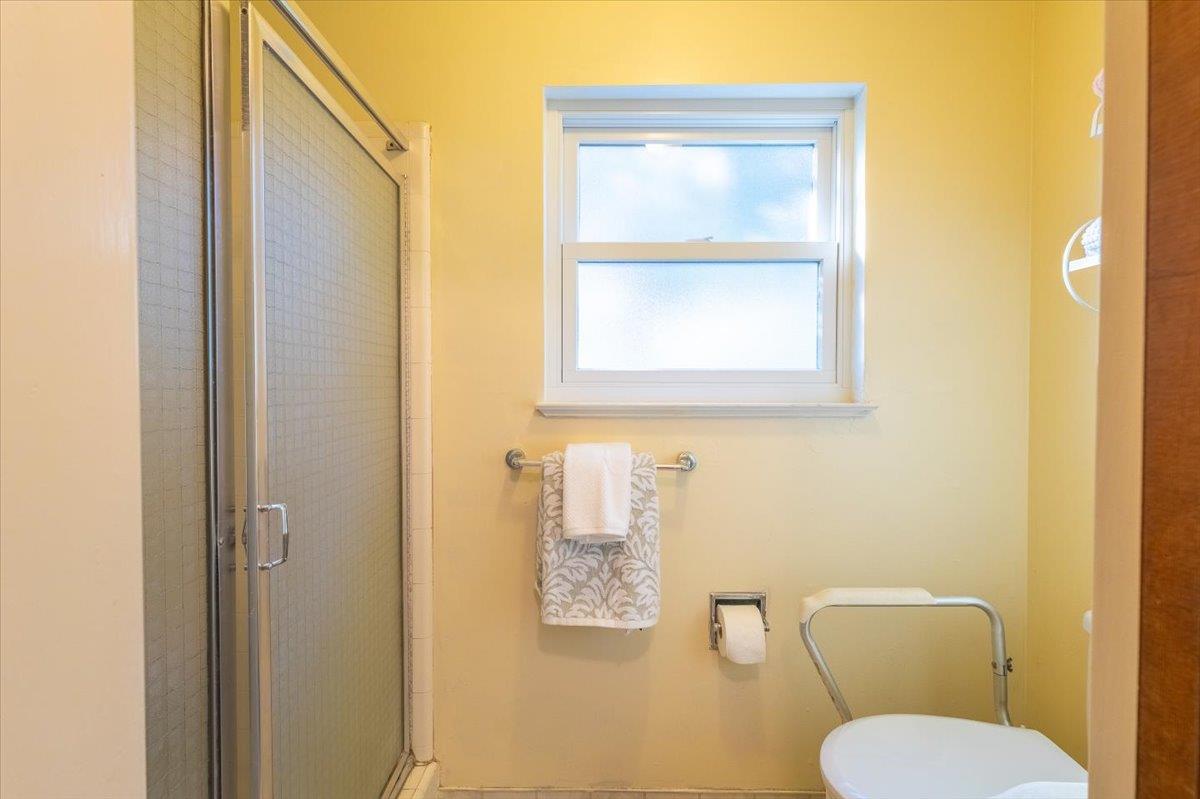 18117 Berta Canyon Road Salinas, CA 93907 - Photo 34 of 56 a white toilet sitting next to a bathroom sink