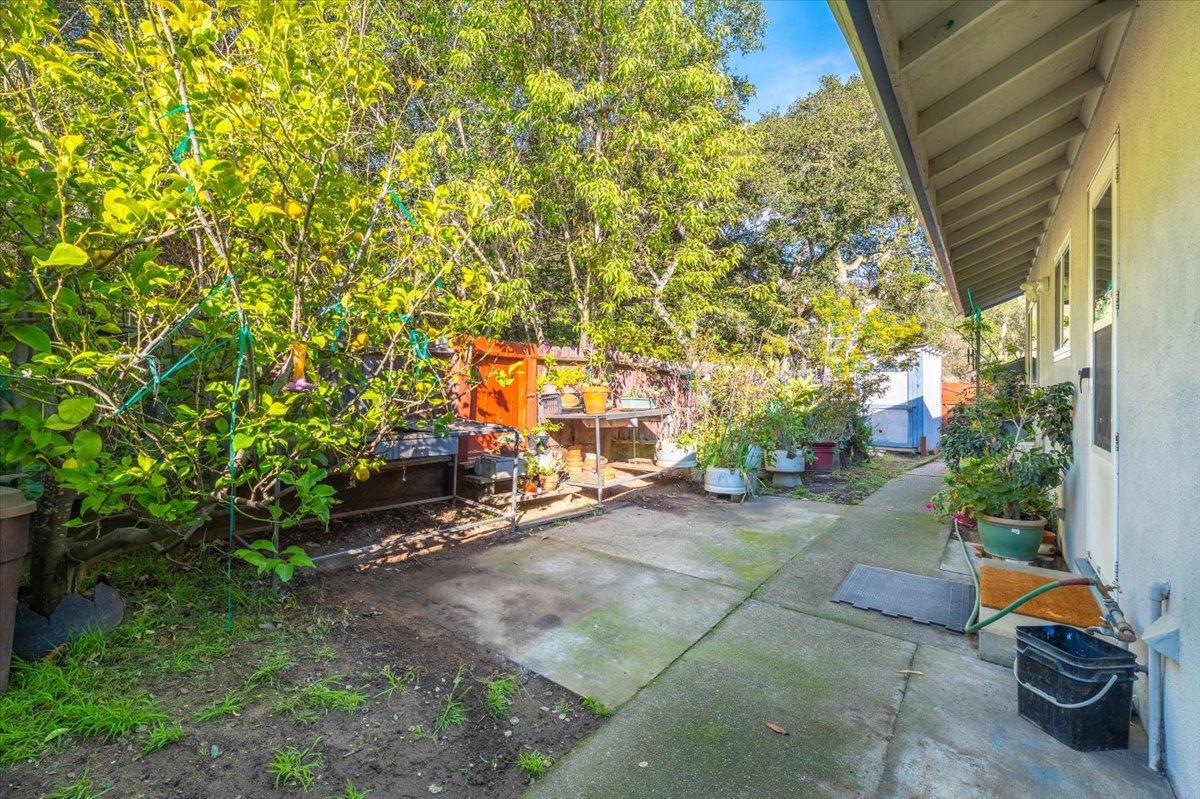 18117 Berta Canyon Road Salinas, CA 93907 - Photo 39 of 56 a backyard of a house with barbeque oven table and chairs