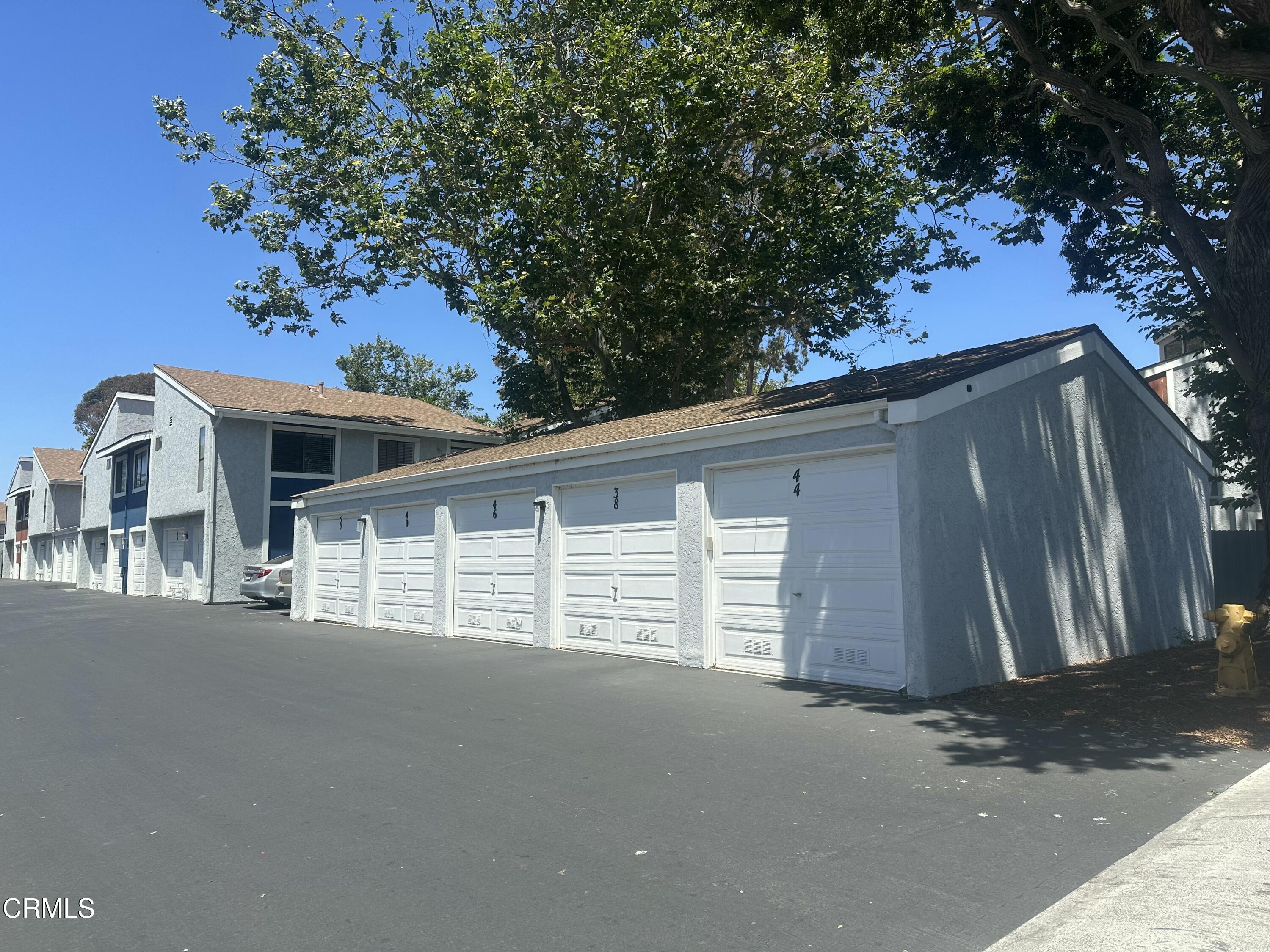 5246 Longfellow Way Oxnard, CA 93033 - Photo 13 of 15 a view of a house with a garage