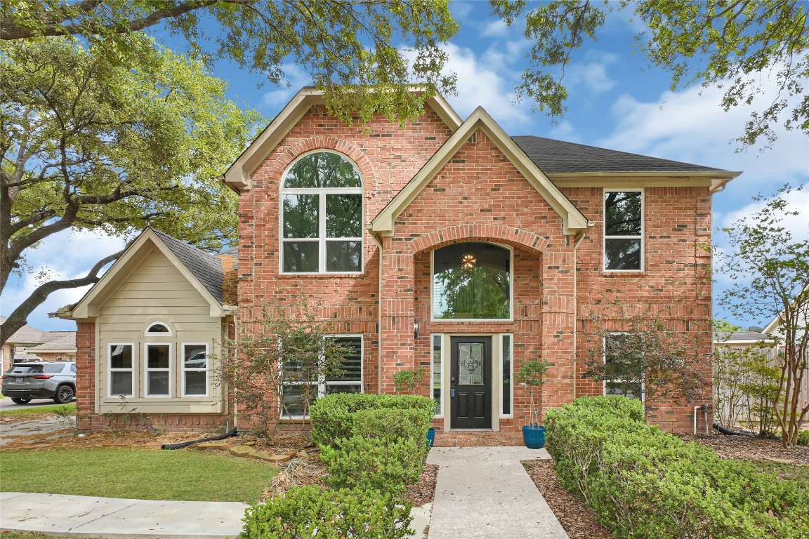 11915 Helene Court Pinehurst, TX 77362 - Photo 1 of 33 front view of a house with a yard