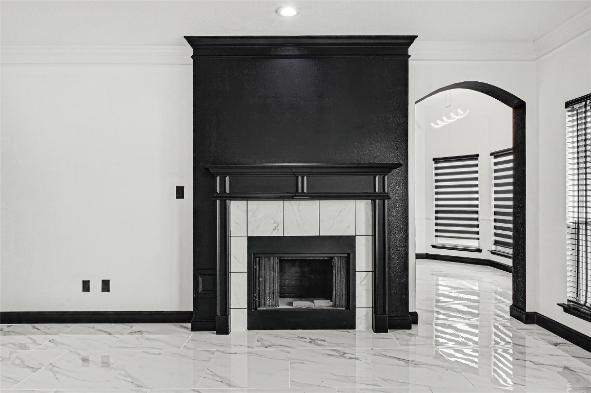 11915 Helene Court Pinehurst, TX 77362 - Photo 11 of 33 a living room with a fireplace