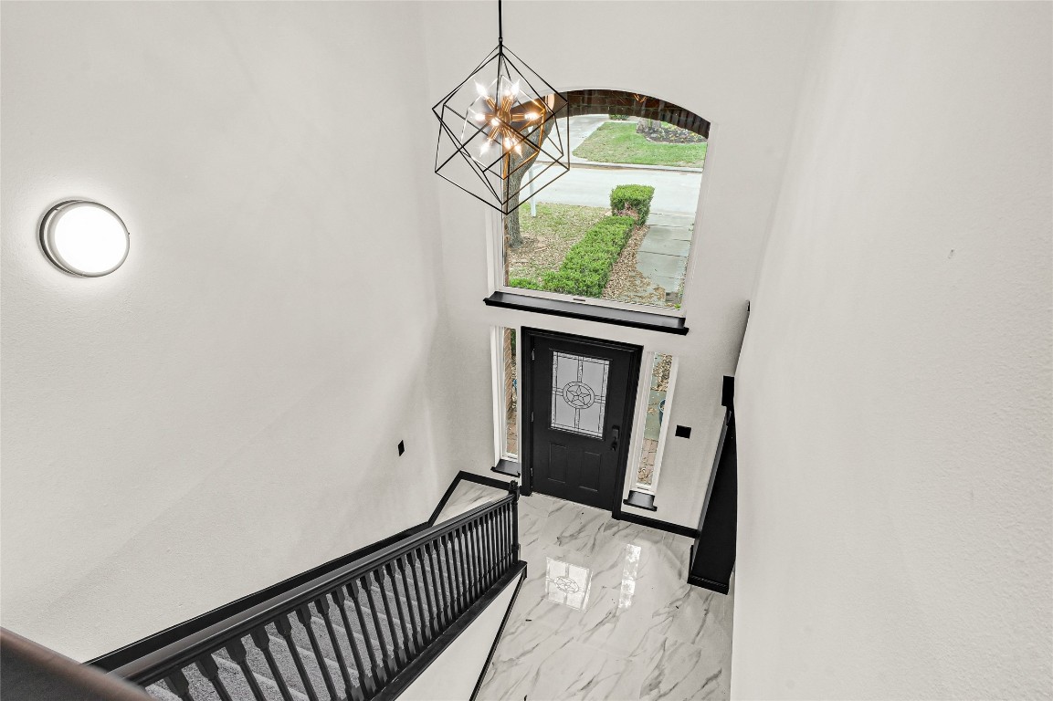 11915 Helene Court Pinehurst, TX 77362 - Photo 13 of 33 a view of hallway with wooden floor