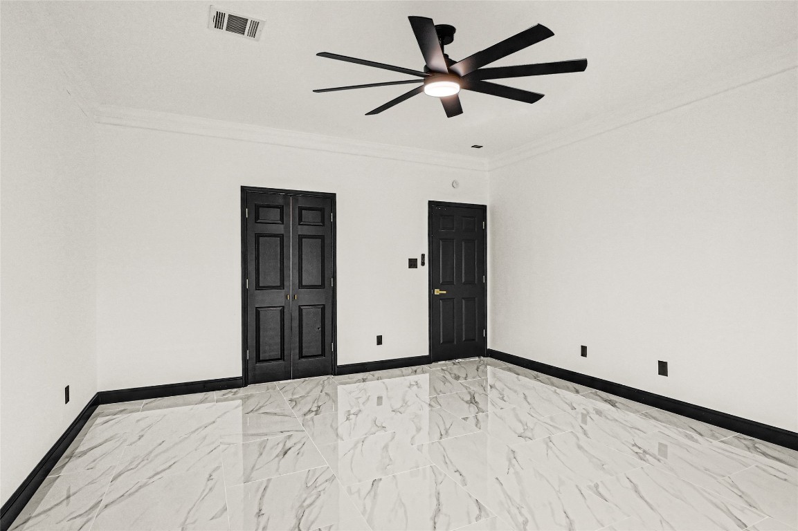 11915 Helene Court Pinehurst, TX 77362 - Photo 27 of 33 an empty room with a ceiling fan and wooden floor