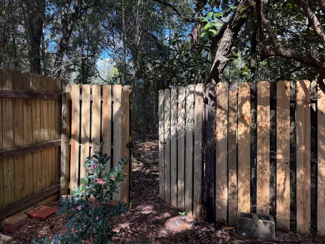 an aerial view of house with yard swimming pool and outdoor seating