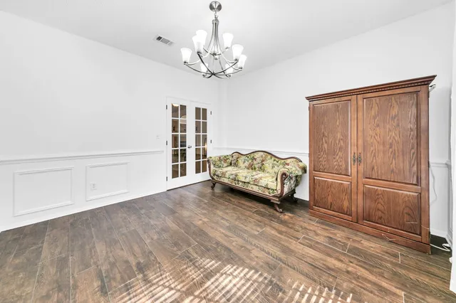 a view of a livingroom with furniture and a fireplace