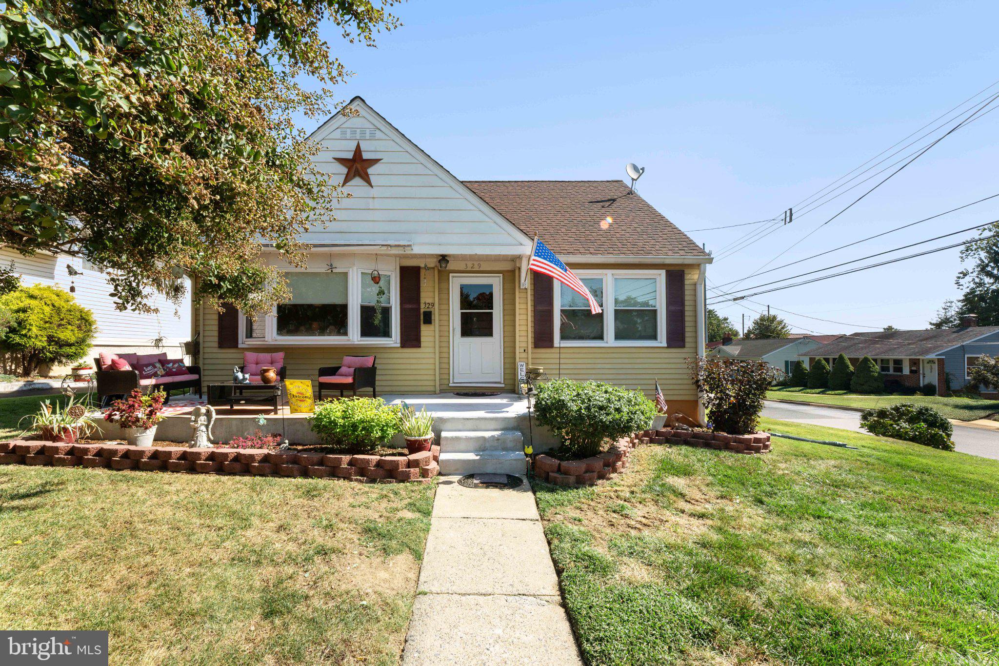 329 Ashland Avenue Secane, PA 19018 - Photo 1 of 33 a front view of a house with garden