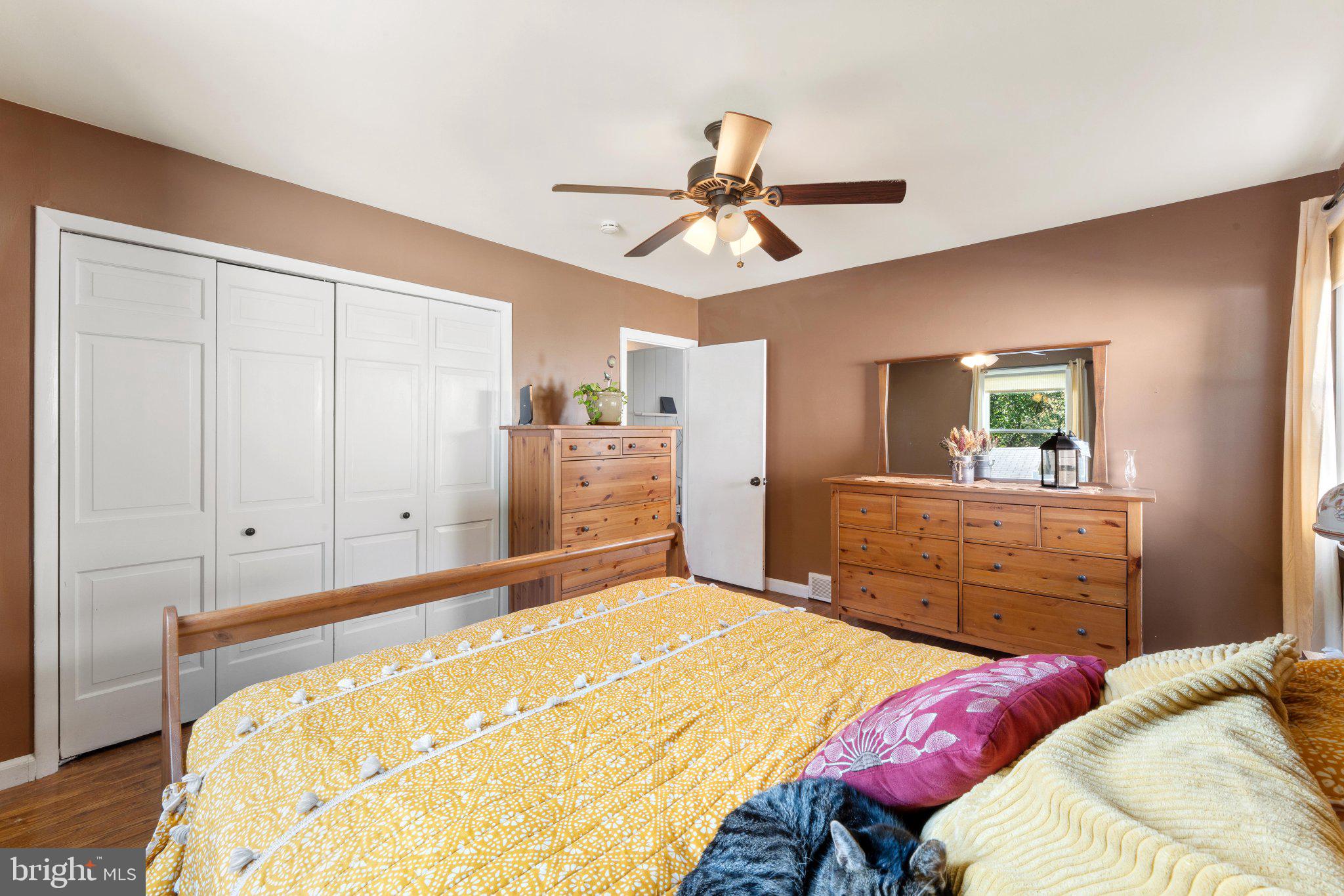 329 Ashland Avenue Secane, PA 19018 - Photo 24 of 33 a bedroom with a bed and a chandelier