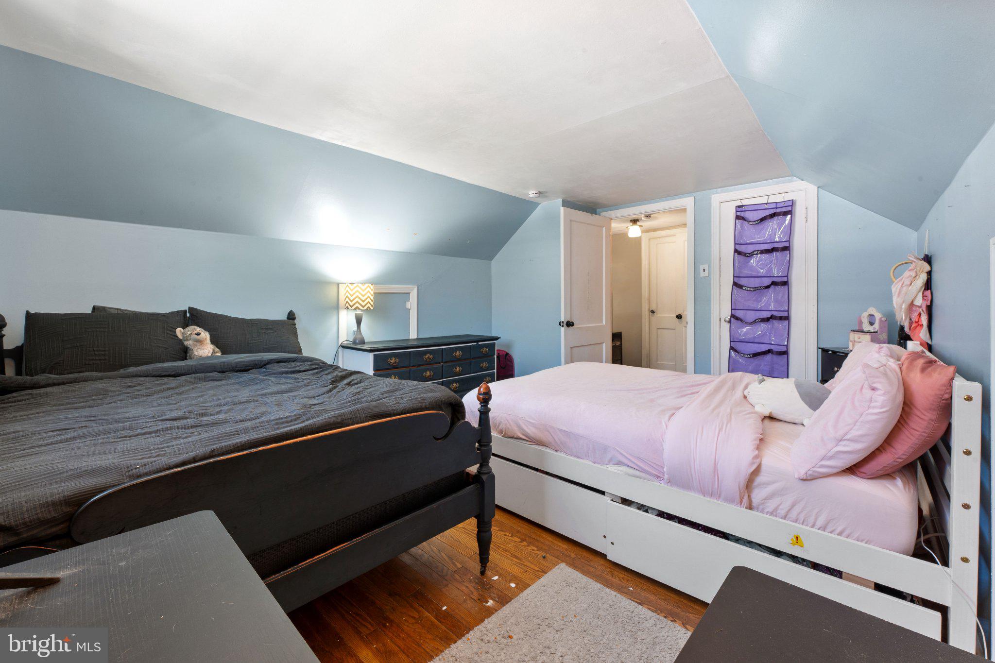 329 Ashland Avenue Secane, PA 19018 - Photo 26 of 33 a bedroom with a bed and a dresser
