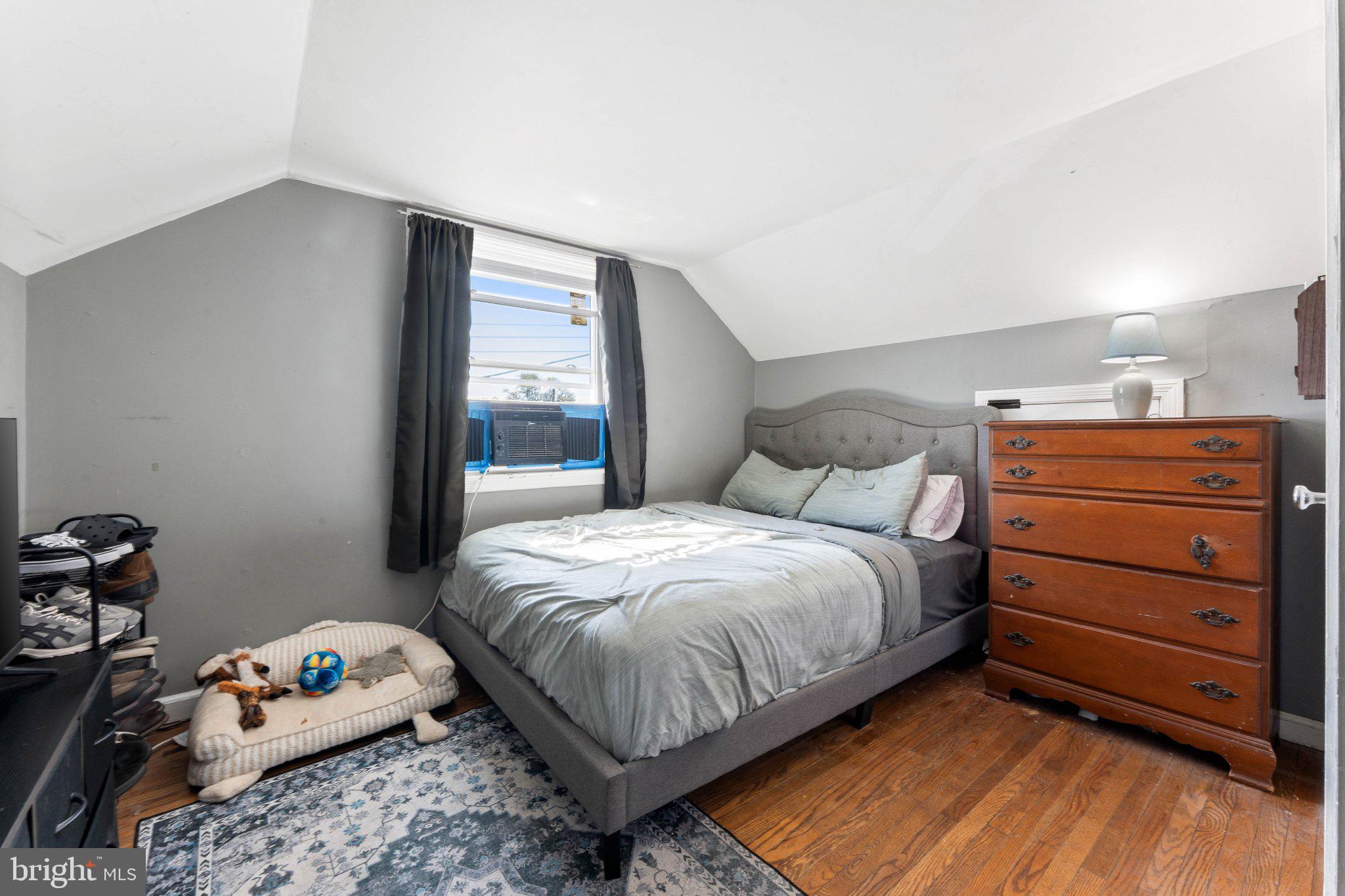 329 Ashland Avenue Secane, PA 19018 - Photo 27 of 33 a bedroom with a bed and a window
