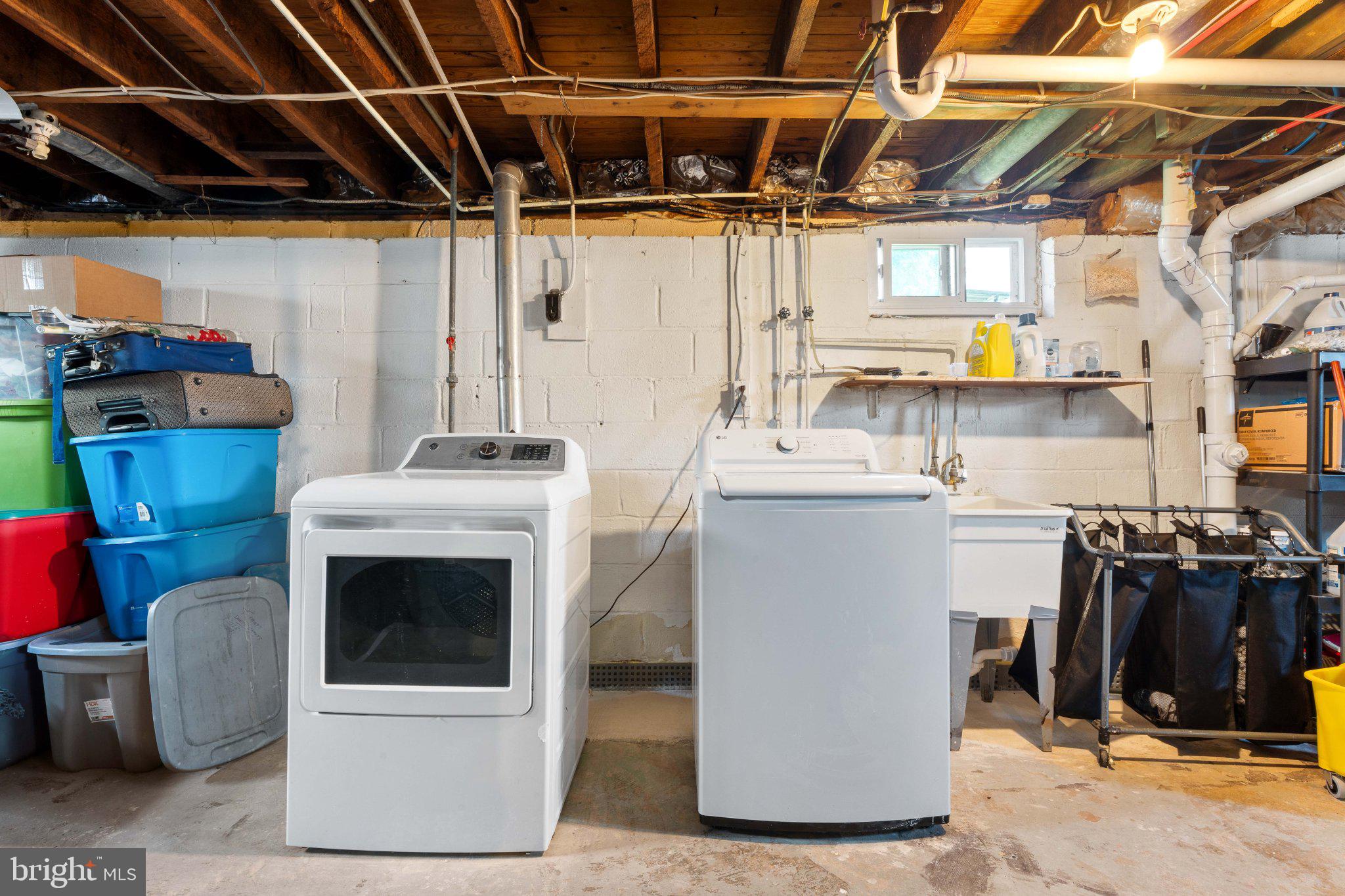 329 Ashland Avenue Secane, PA 19018 - Photo 33 of 33 a utility room with dryer and washer