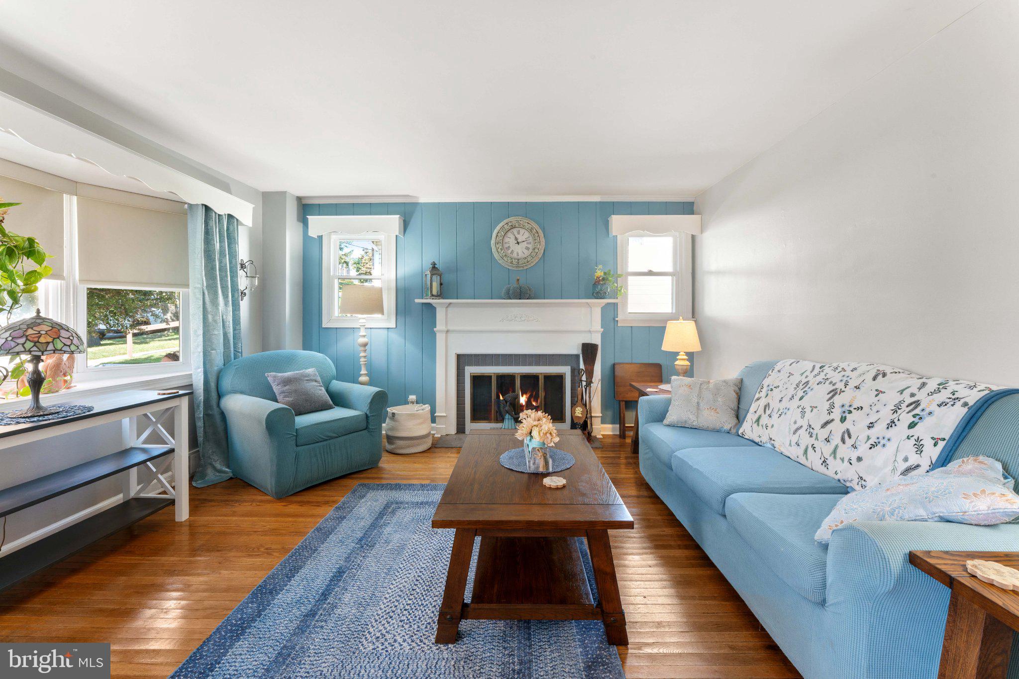 329 Ashland Avenue Secane, PA 19018 - Photo 10 of 33 a living room with furniture and a fireplace