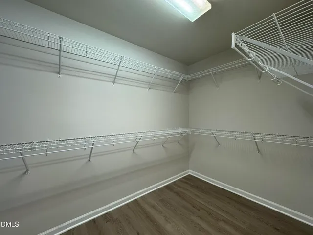 a view of a room with racks on the wall