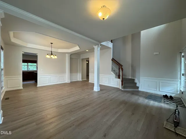 a view of a livingroom with wooden floor