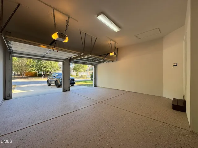 a view of a swimming pool with an outdoor space and seating area